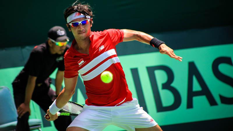 Christopher Rungkat saat berhadapan dengan petenis Vietnam, Ly Hoang Nam. - INDOSPORT